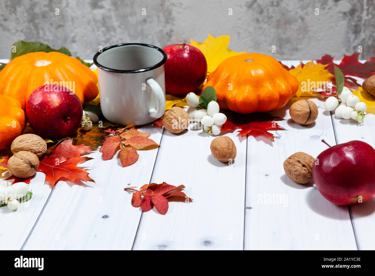 Autumn perspective background with pumpkins,apples and tea Stock Photo