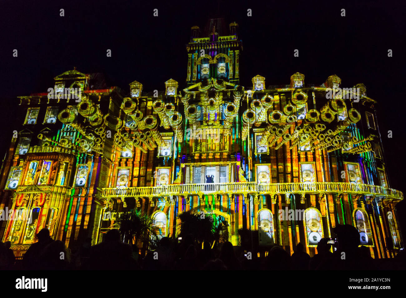 Bournemouth, Dorset UK. 29th September 2019. Bournemouth Arts by the Sea Festival event with this year's theme of Mind Matter. As the festival comes to a close, crowds turn out to see Hotel D'Illusions by Illuminos. The Town Hall building comes to life using projection mapping technology taking the audience back to the Victorian era featuring magic, science and hypnosis. Credit: Carolyn Jenkins/Alamy Live News Stock Photo