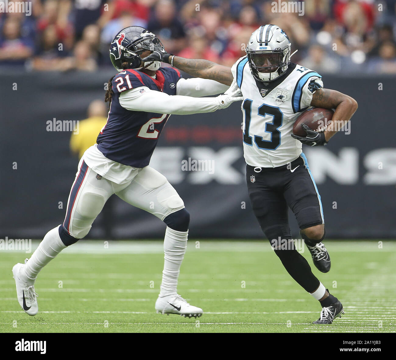 Houston, Texas, USA. 29th Sep, 2019. Houston Texans cornerback Bradley Roby (21) forces Carolina Panthers wide receiver Jarius Wright (13) out of bounds after a catch during an NFL game between the Houston Texans and the Carolina Panthers at NRG Stadium in Houston, Texas, on Sept. 29, 2019. Credit: Scott Coleman/ZUMA Wire/Alamy Live News Stock Photo