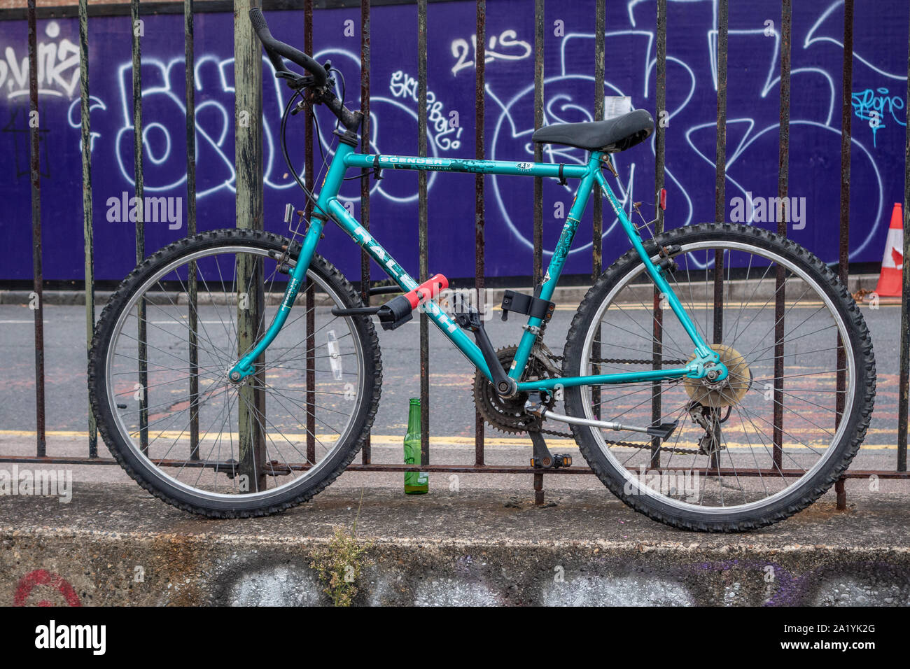 Bike fence parked railings hi-res stock photography and images - Alamy