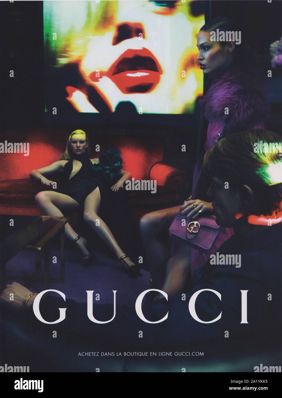 poster advertising GUCCI fashion house in paper magazine from 2011 year,  advertisement, creative GUCCI 2010s advert Stock Photo - Alamy