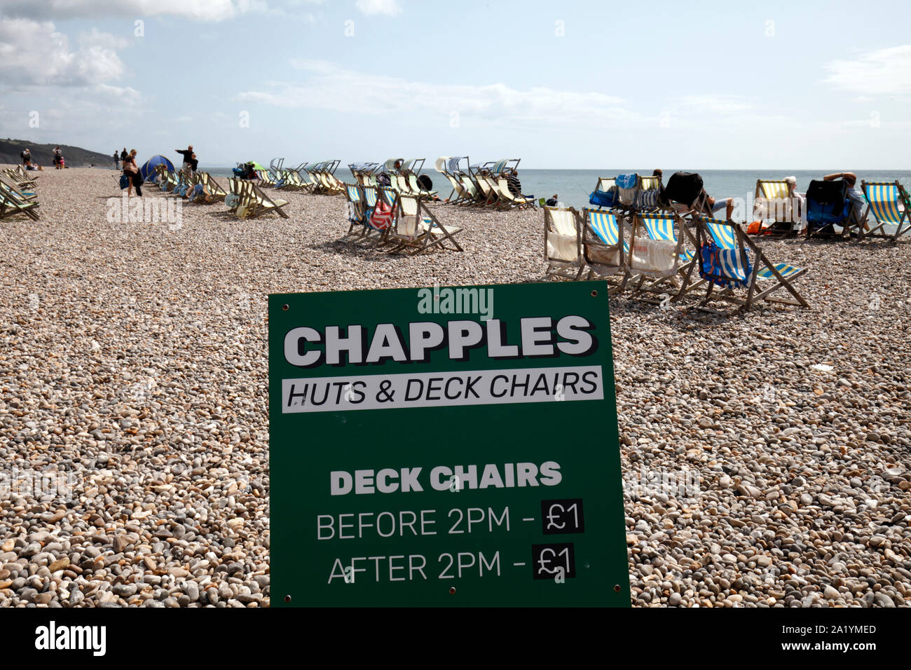 Chapples deckchair hire, Beer pebble beach, East Devon, UK Stock Photo
