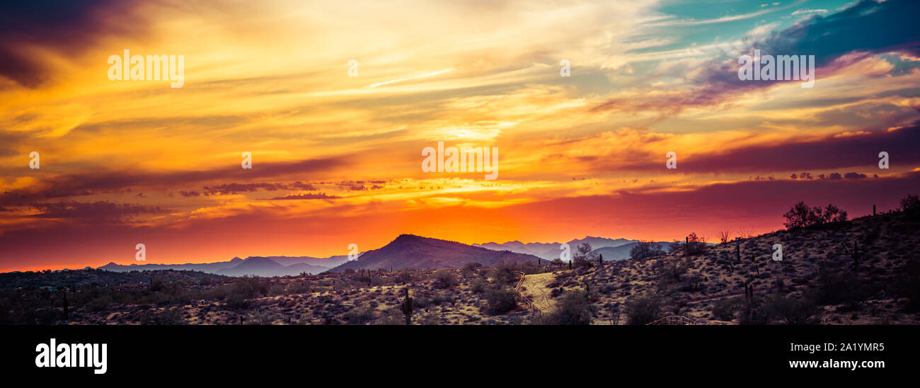 A sunset over the Sonoran Desert of Arizona with high altitude clouds