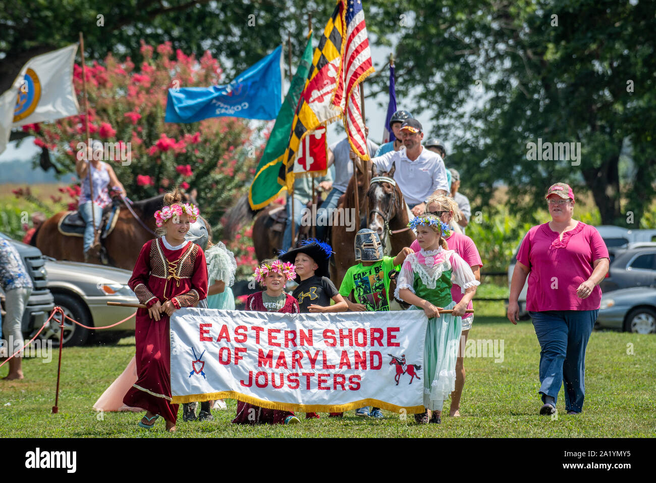 The procession of flags and riders before the Old St. Joseph's church
