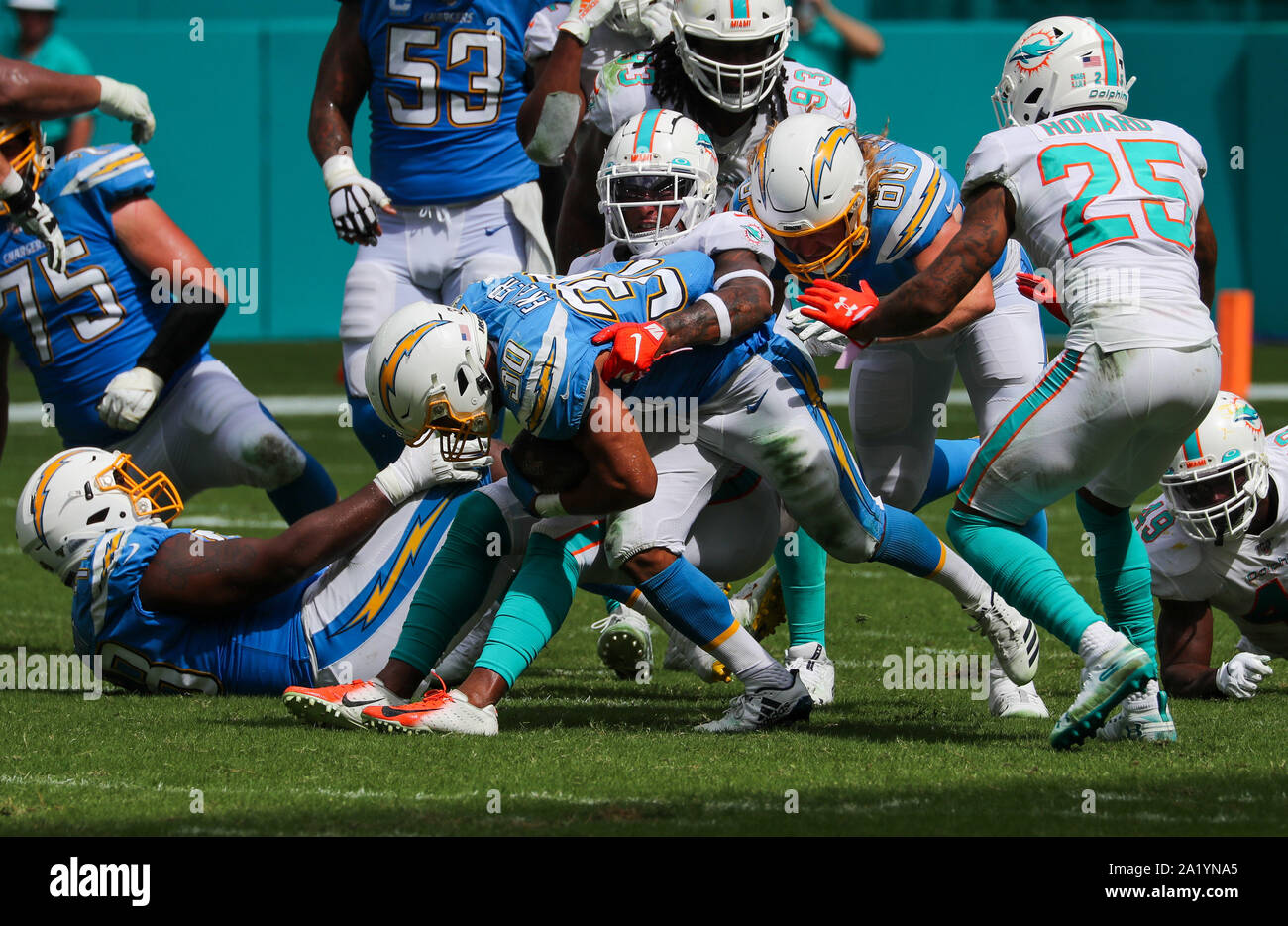 Miami Dolphins defensive tackle Davon Godchaux (56) reacts after sacking New  England Patriots quarterback Tom Brady, during the first half of an NFL  football game, Sunday, Dec. 9, 2018, in Miami Gardens