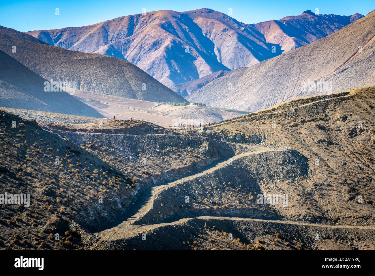 Dirt roadways carved into the hills of Vicuna, Chile. Stock Photo