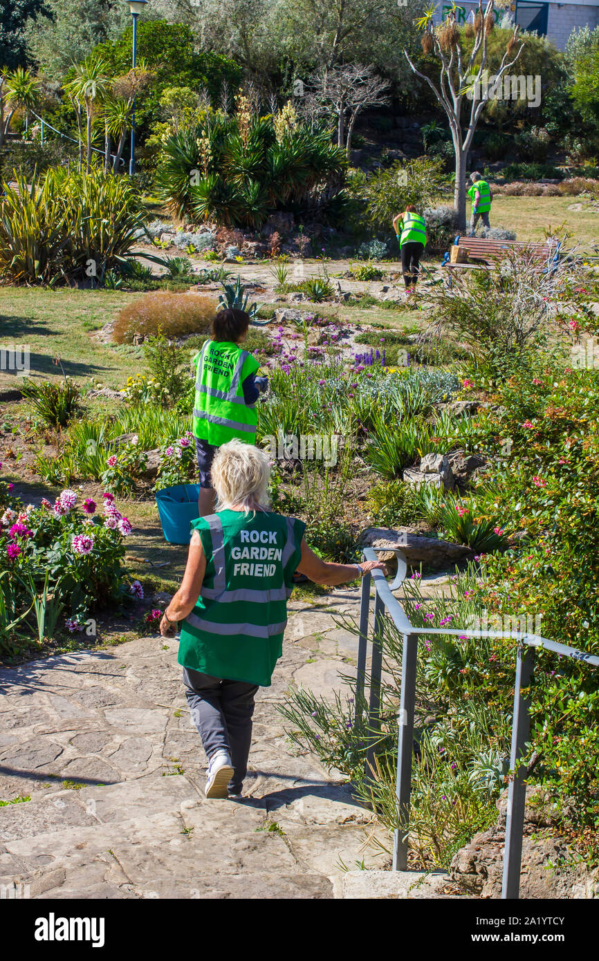 18 September 2019 Rock Garden Volunteer Friends at work in the Portsmouth Rock Garden on a hot early autumn day in September Stock Photo