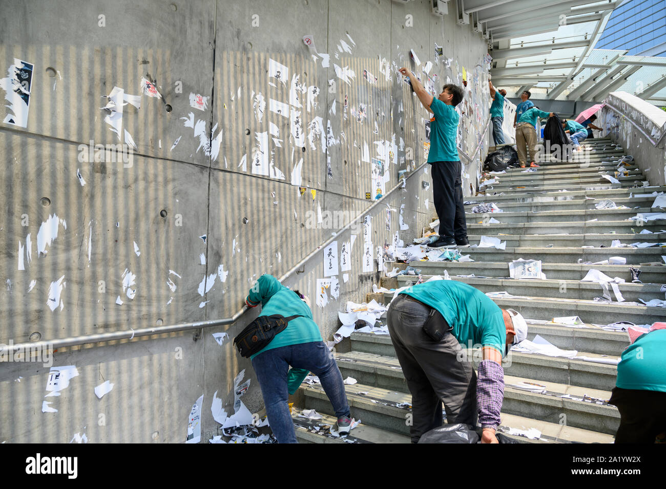 29 September 2019 Tamar, Admiralty, Hong Kong. Clean up after the protest marking the 5th anniversary of the Umbrella Movement the day before. Stock Photo