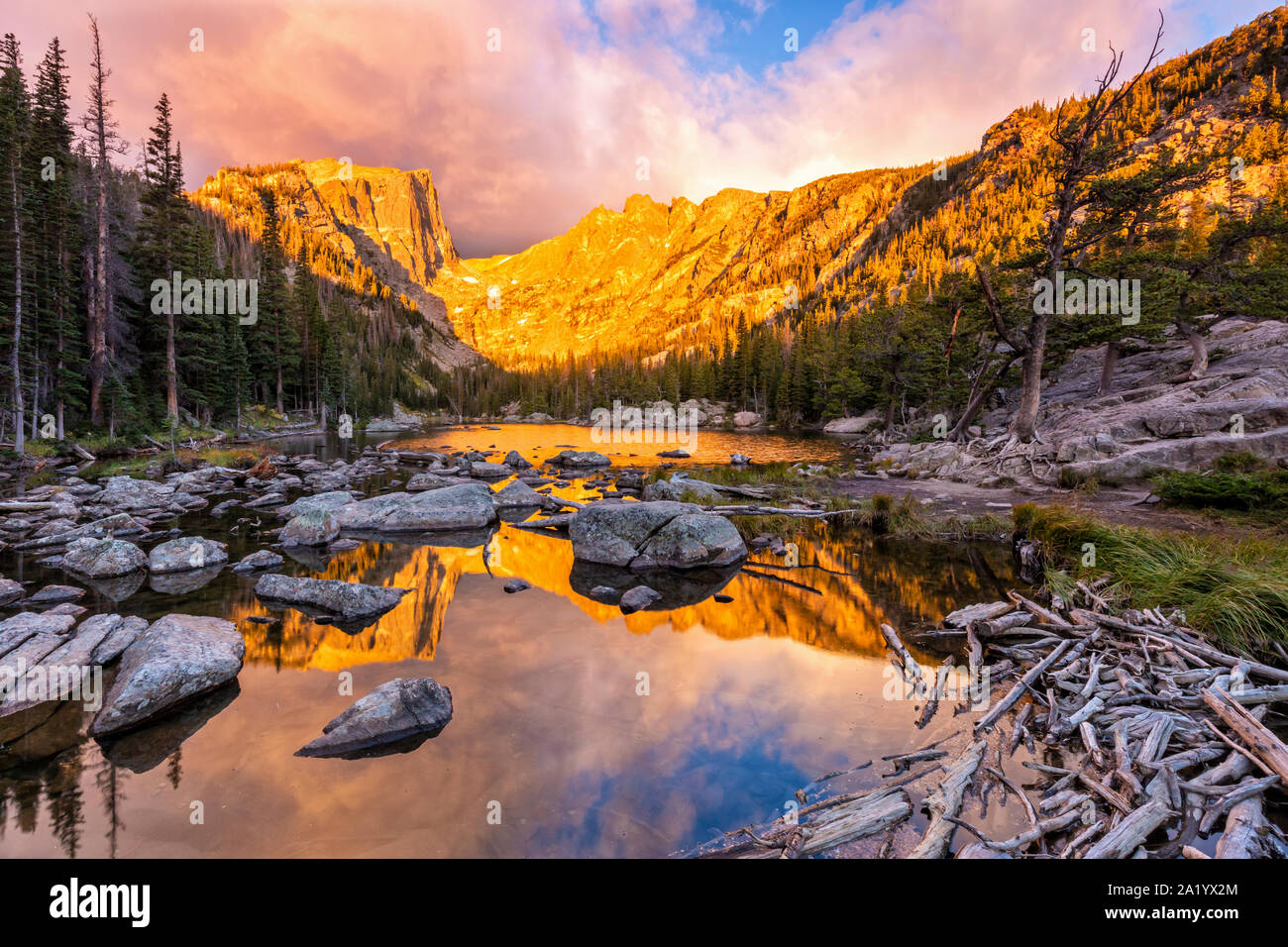 A glorious golden sunrise on Dream Lake in Rocky Mountain National Park, Colorado. Stock Photo