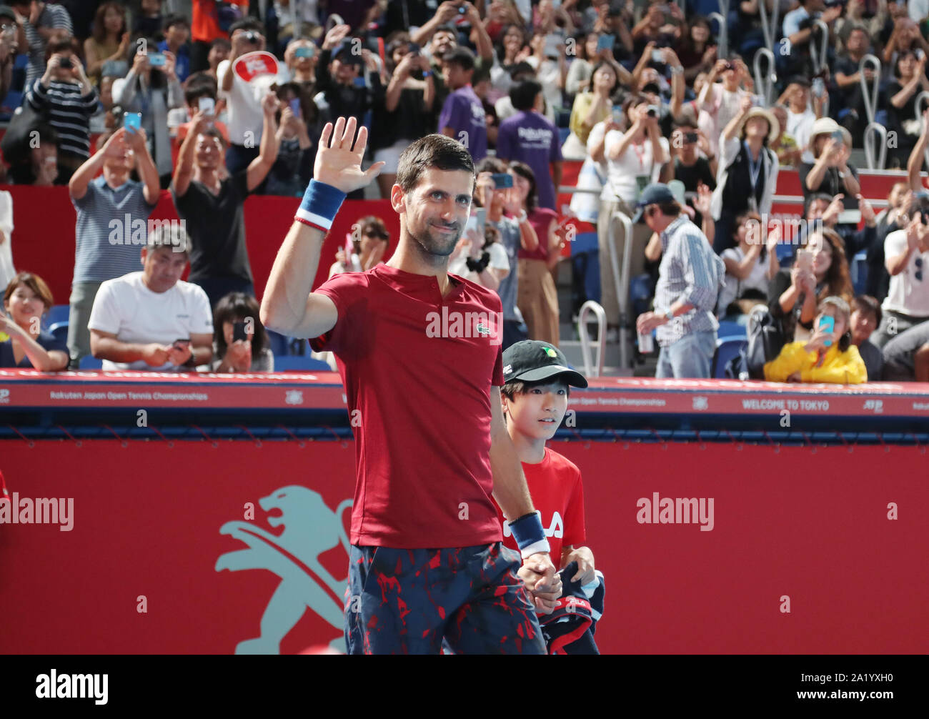 Tokyo, Japan. 29th Sep, 2019. World's No.1 ranker Novak Djokovic of Serbia reacts to audience as he enters the court for a training session for the Rakuten Japan Open tennis championships at the Ariake Colosseum in Tokyo on Sunday, September 29, 2019. A 2 million US dollars ATP500 tournament will be held here from September 30 through October 6. Credit: Yoshio Tsunoda/AFLO/Alamy Live News Stock Photo