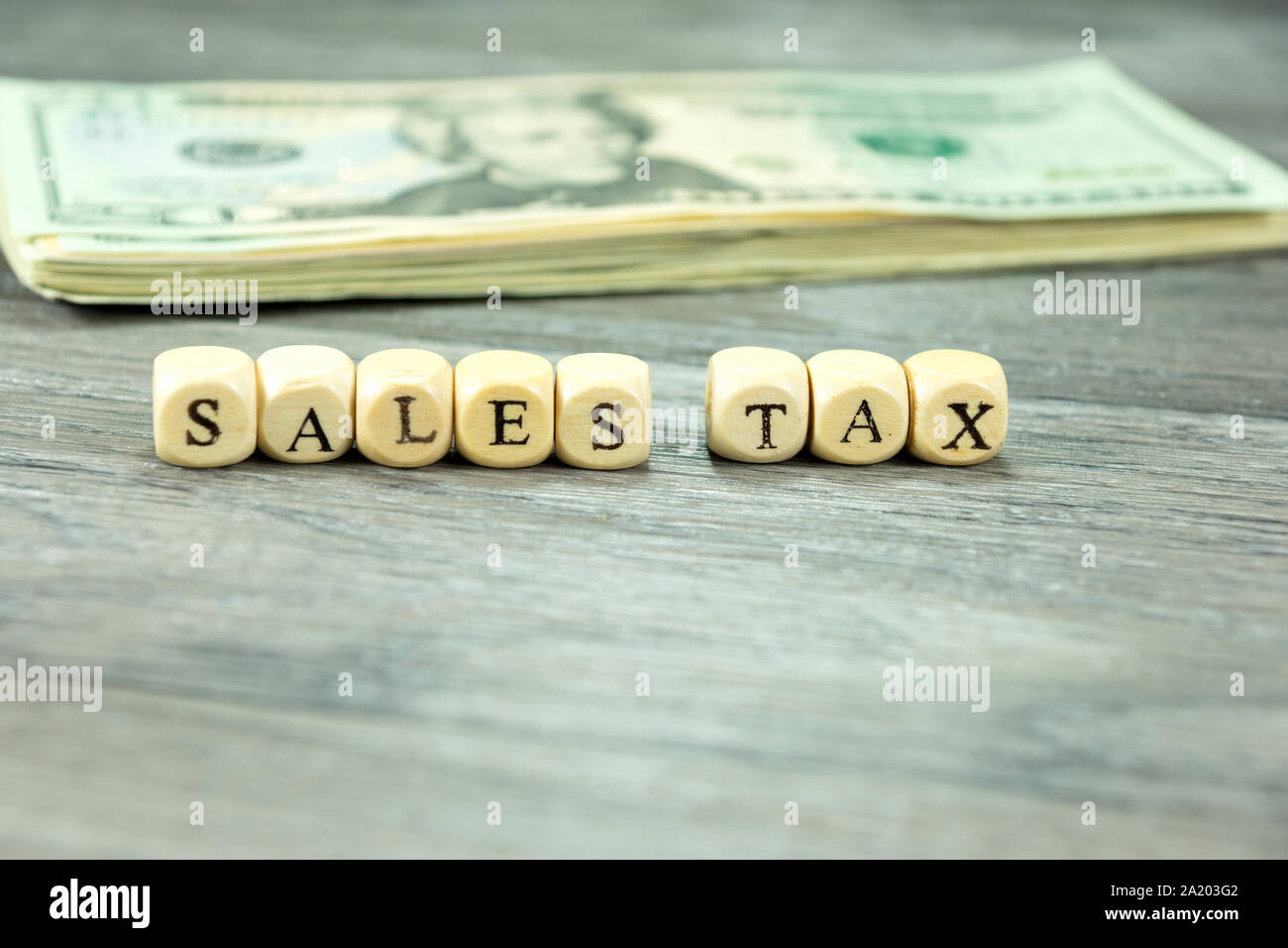Dollar bills and sales taxes in United States Stock Photo Alamy