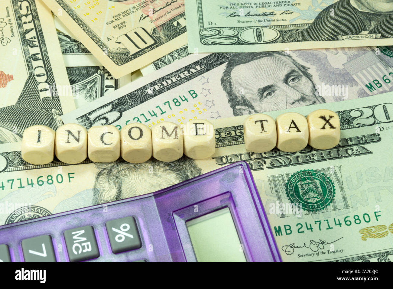 Dollar bills and tax in America Stock Photo Alamy