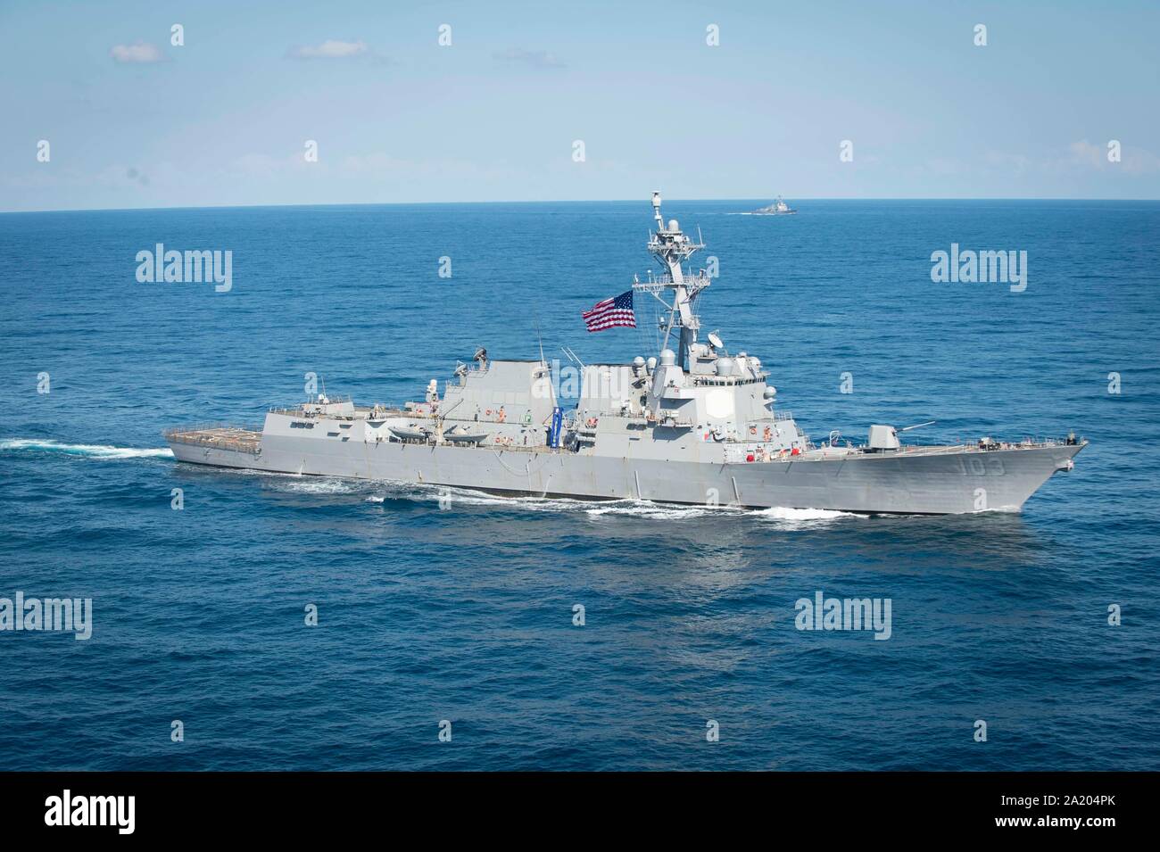 190928-N-QD512-1252  ATLANTIC OCEAN (Sept. 28, 2019) The guided-missile destroyer USS Truxtun (DDG 103) transits the Atlantic Ocean during a photo exercise with the aircraft carrier USS Dwight D. Eisenhower to conclude Tailored Ship's Training Availability (TSTA) and Final Evaluation Problem (FEP) as part of the basic phase of the Optimized Fleet Response Plan. (U.S. Navy photo by Mass Communication Specialist 3rd Class Kaleb J. Sarten) Stock Photo