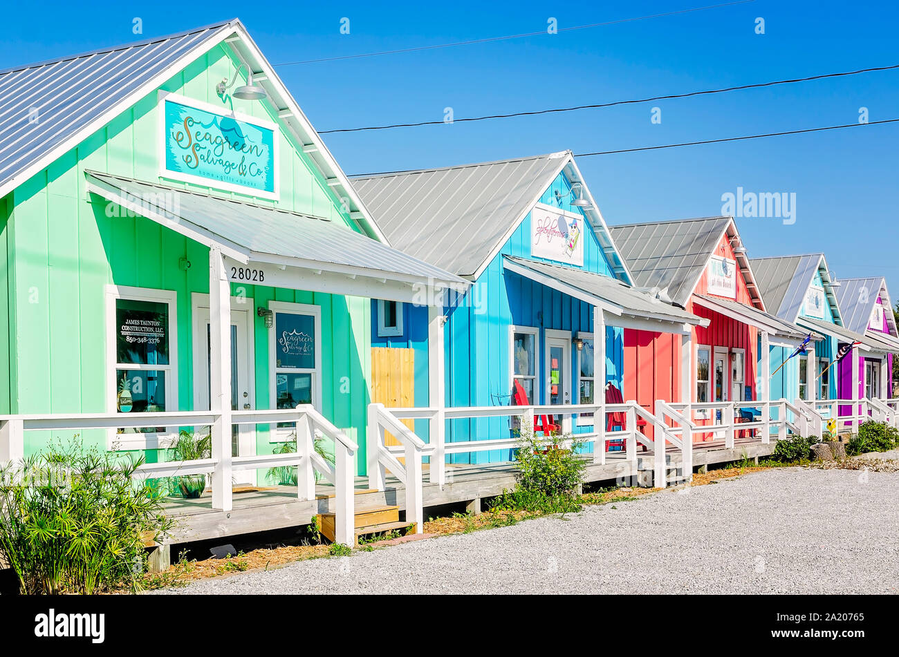 Colorful beach cottages serve as quaint shops along Highway 98, Sept