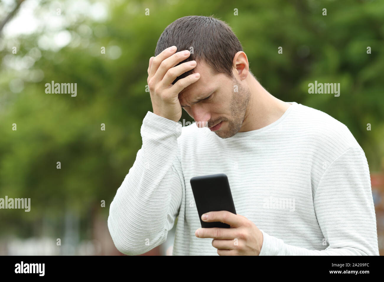Sad Man Has Bad Online Chat News and Feels Disappointed on the Smartphone.  Stock Photo - Image of disappointment, frustration: 230679098