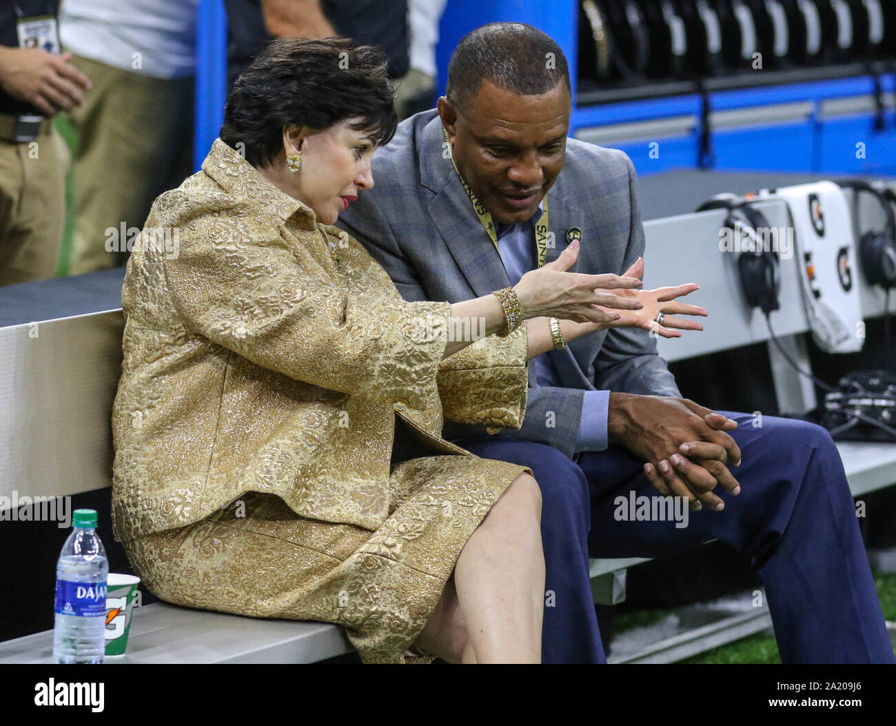 New Orleans, LA, USA. 29th Sep, 2019. New Orleans Saints and Pelicans owner Mrs. Gayle Benson (left) sits and talks with New Orleans Pelicans Head Coach Alvin Gentry (right) before NFL game action between the New Orleans Saints and the Dallas Cowboys at the Mercedes Benz Superdome in New Orleans, LA. Jonathan Mailhes/CSM/Alamy Live News Stock Photo