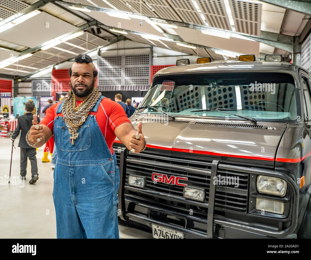 A man in a fancy dress costume as BA Baracus standing in front of a replica of the A Team van at the annual Nor-Con movie and comic book convention Stock Photo