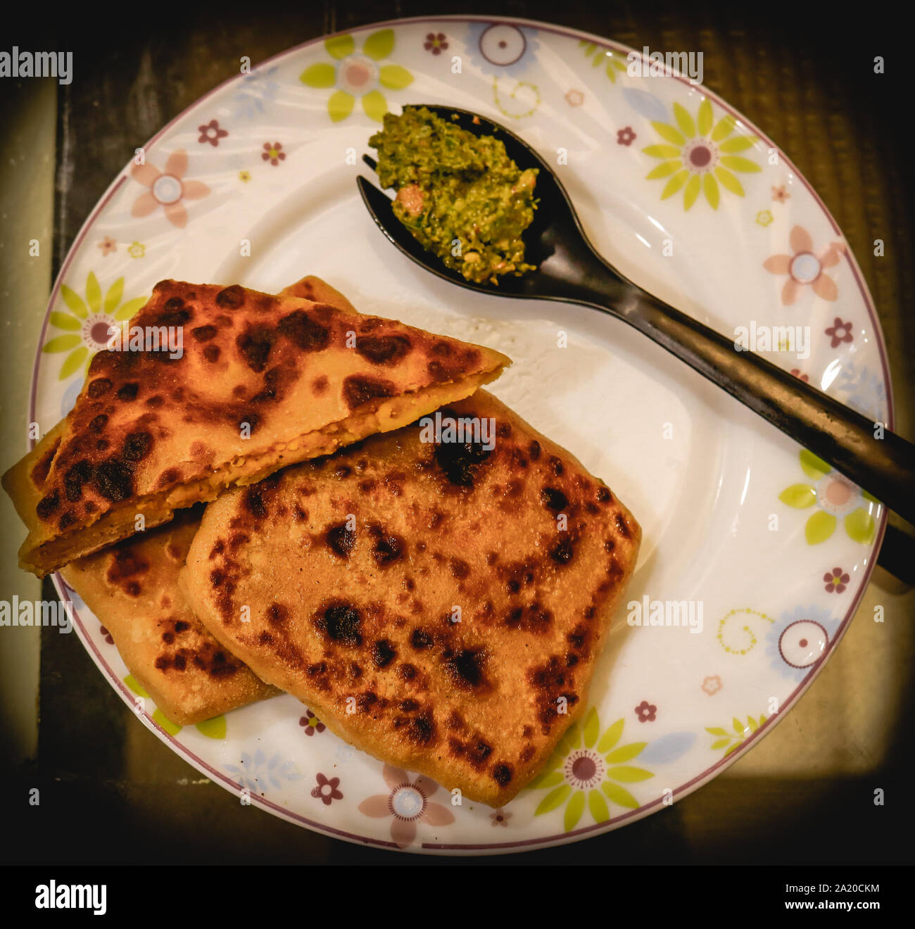 Healthy indian stuffed parotha, stuffed with indian legumes in bardoli. Stock Photo