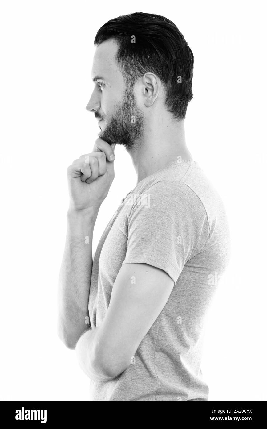 Studio portrait of young handsome man shot in black and white Stock ...