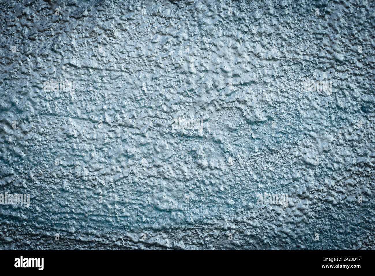 Gray shiny concrete background. Cement texture of blue wall. Grey rough painted grunge wall. Old raggy surface with metallic gloss. Abstract architect Stock Photo