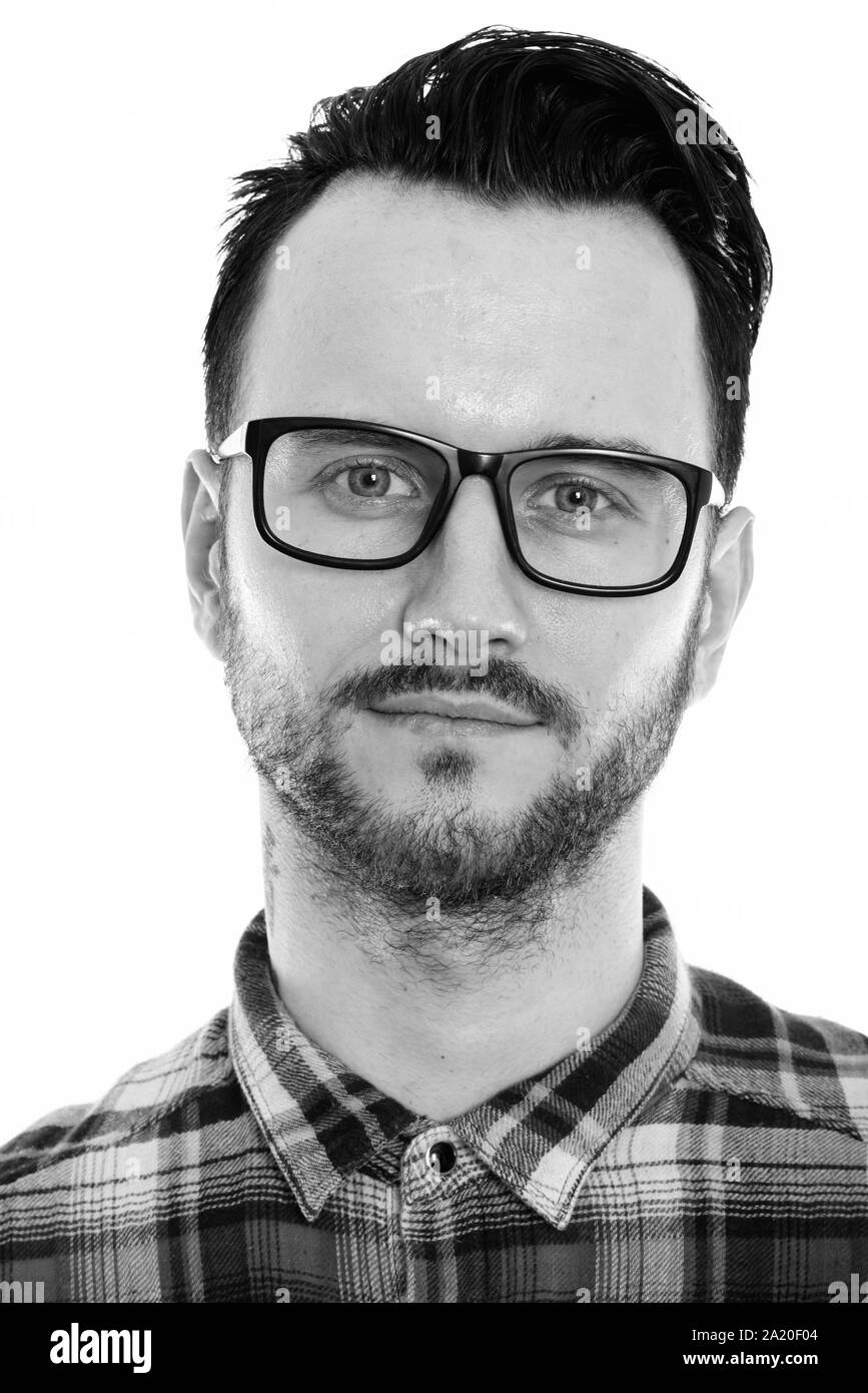 Studio portrait of young handsome man shot in black and white Stock ...