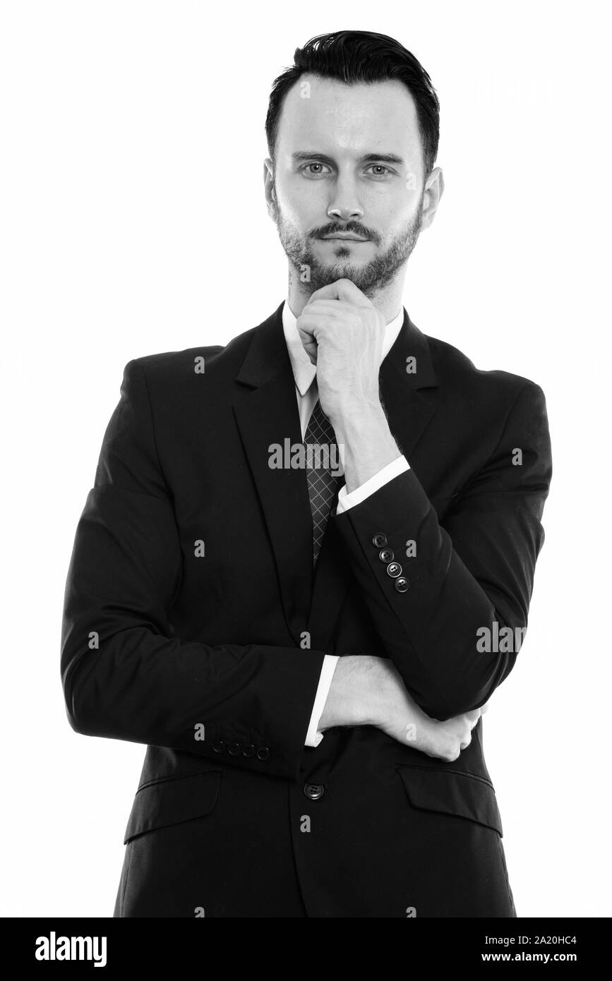 Studio portrait of young handsome man shot in black and white Stock ...