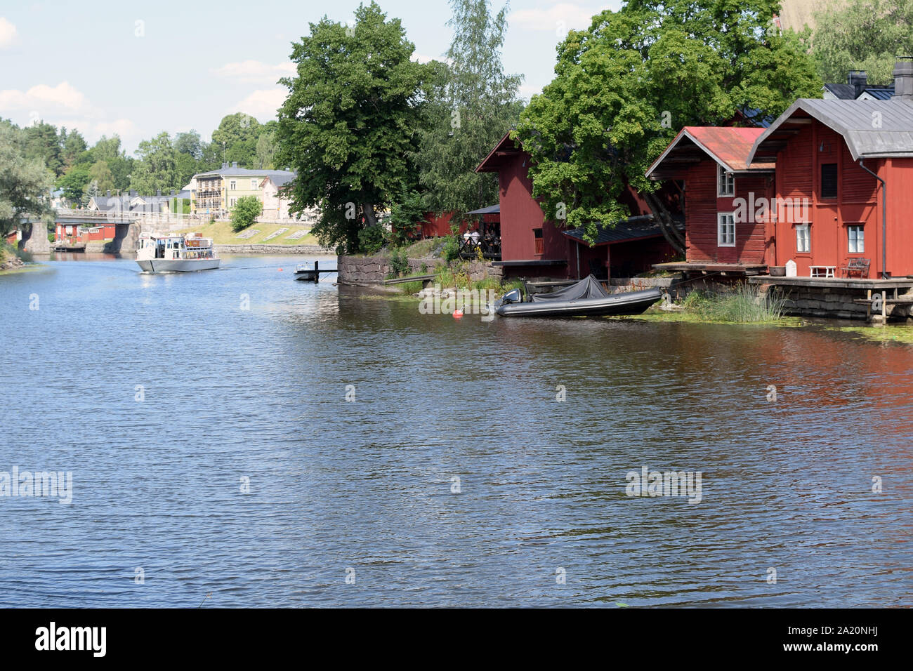 River Porvoo (Porvoonjoki in Finnish) and old wooden red houses on the riverside. Stock Photo
