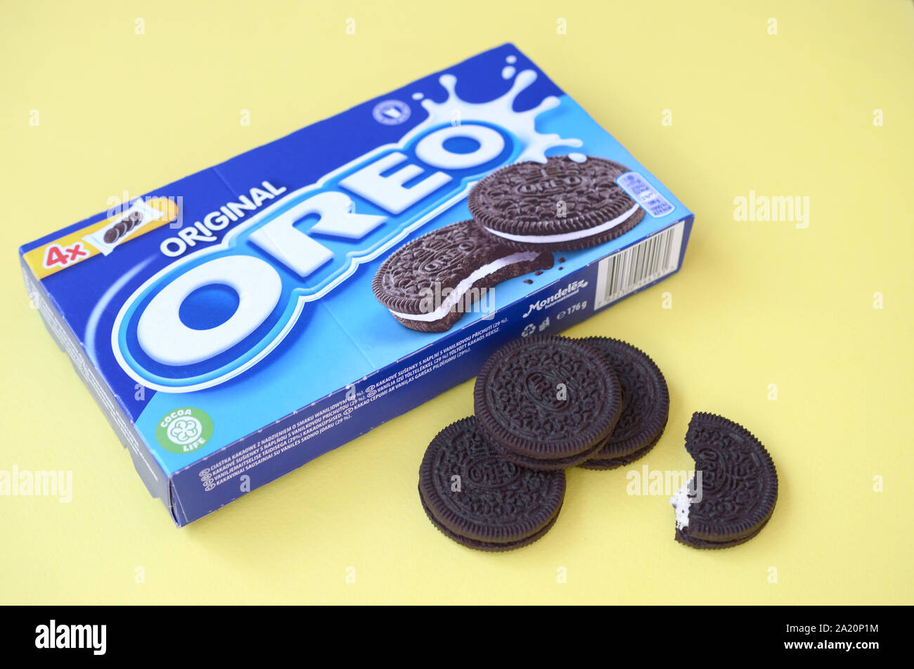 KHARKOV, UKRAINE - SEPTEMBER 8, 2019: Many OREO sandwich cream biscuits  with pack on yellow background. Oreo is a sandwich cookie with a sweet  cream i Stock Photo - Alamy