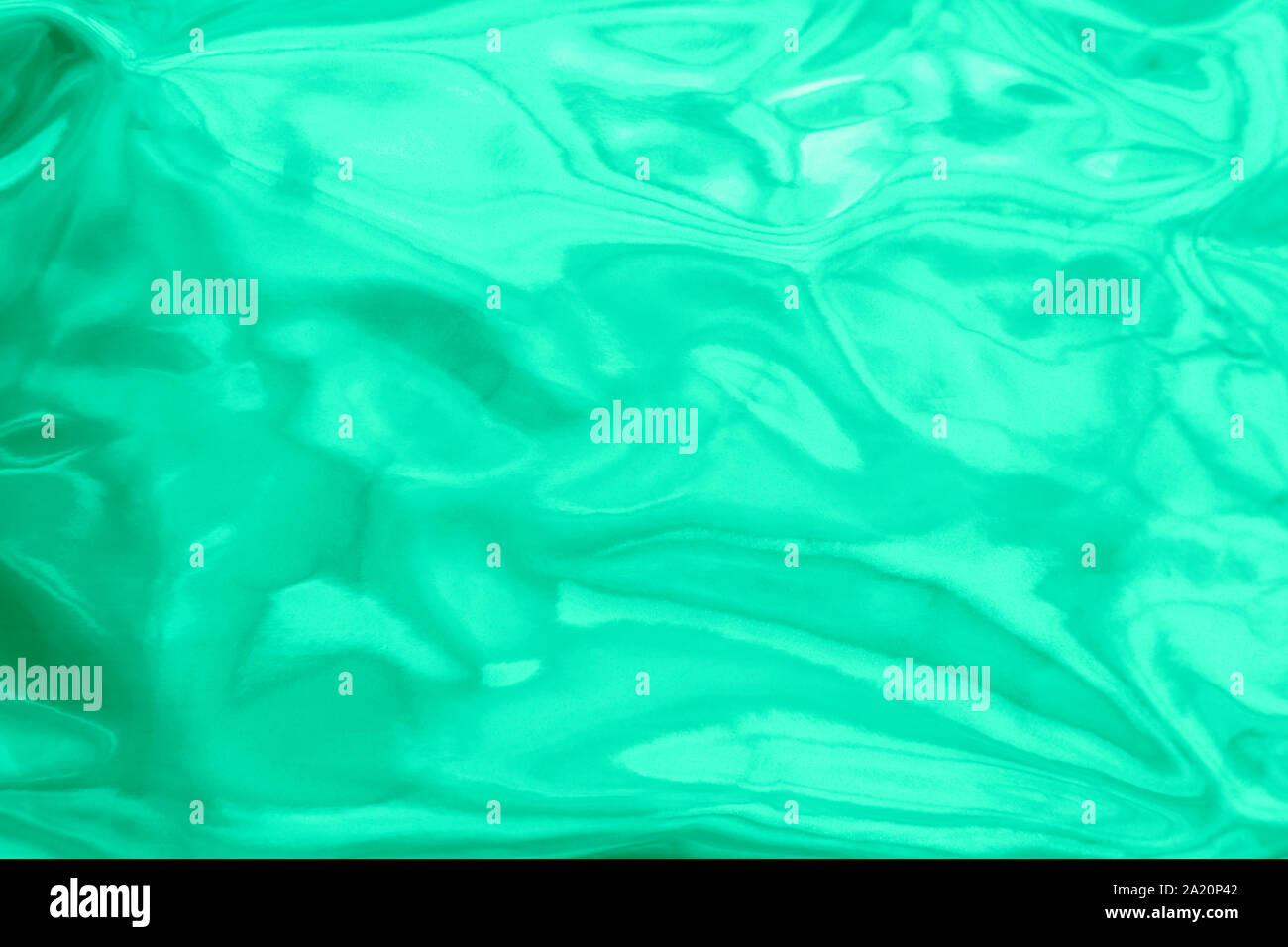 Holographic wrinkled abstract foil texture. Glittering blurred surface ...
