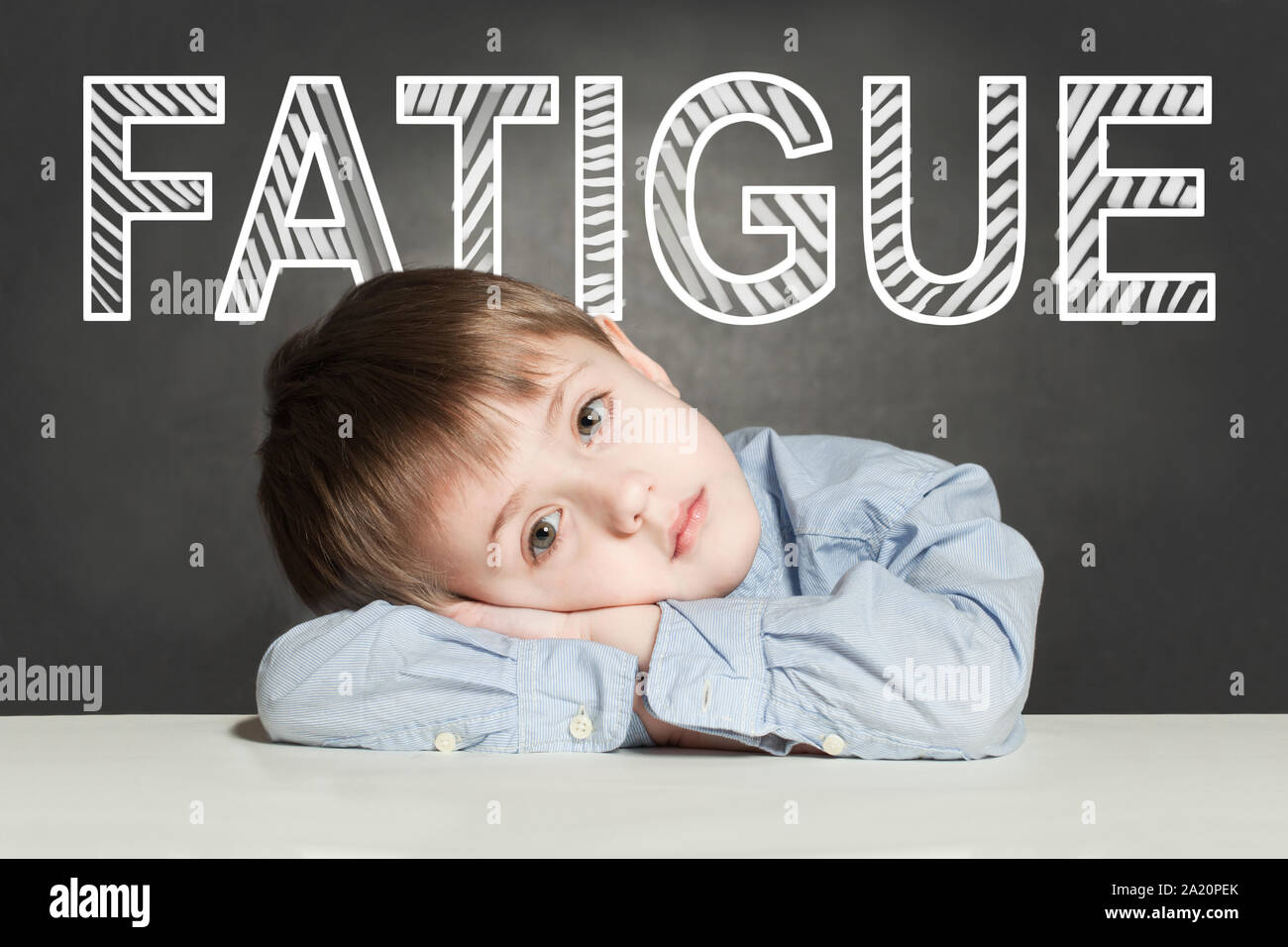 sad Tired child boy with Fatigue Stock Photo