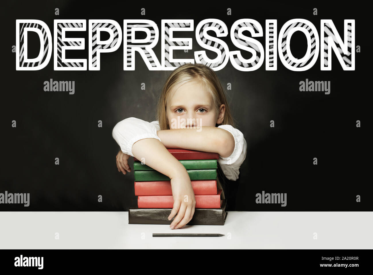 Tired child with books. Depression concept Stock Photo