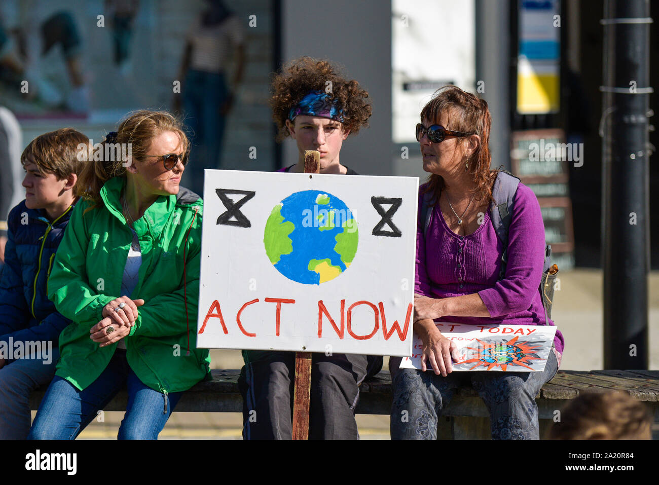 Protestors waiting to participate in the Extinction Rebellion climate strike in Truro City City in Cornwall. Stock Photo