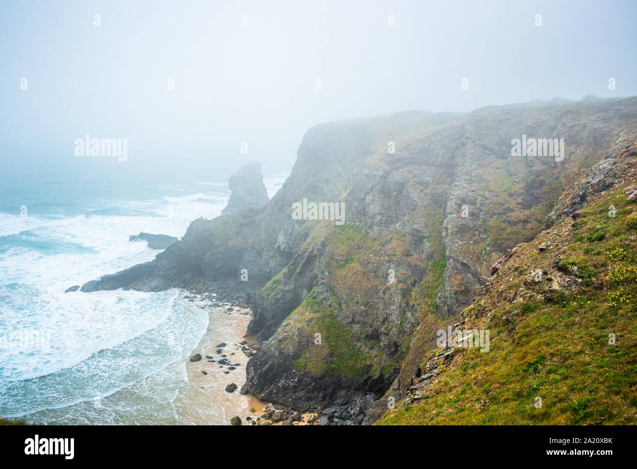 Bedruthan Steps on a foggy day, near Newquay, Cornwall, England, Great Britain, UK. Stock Photo