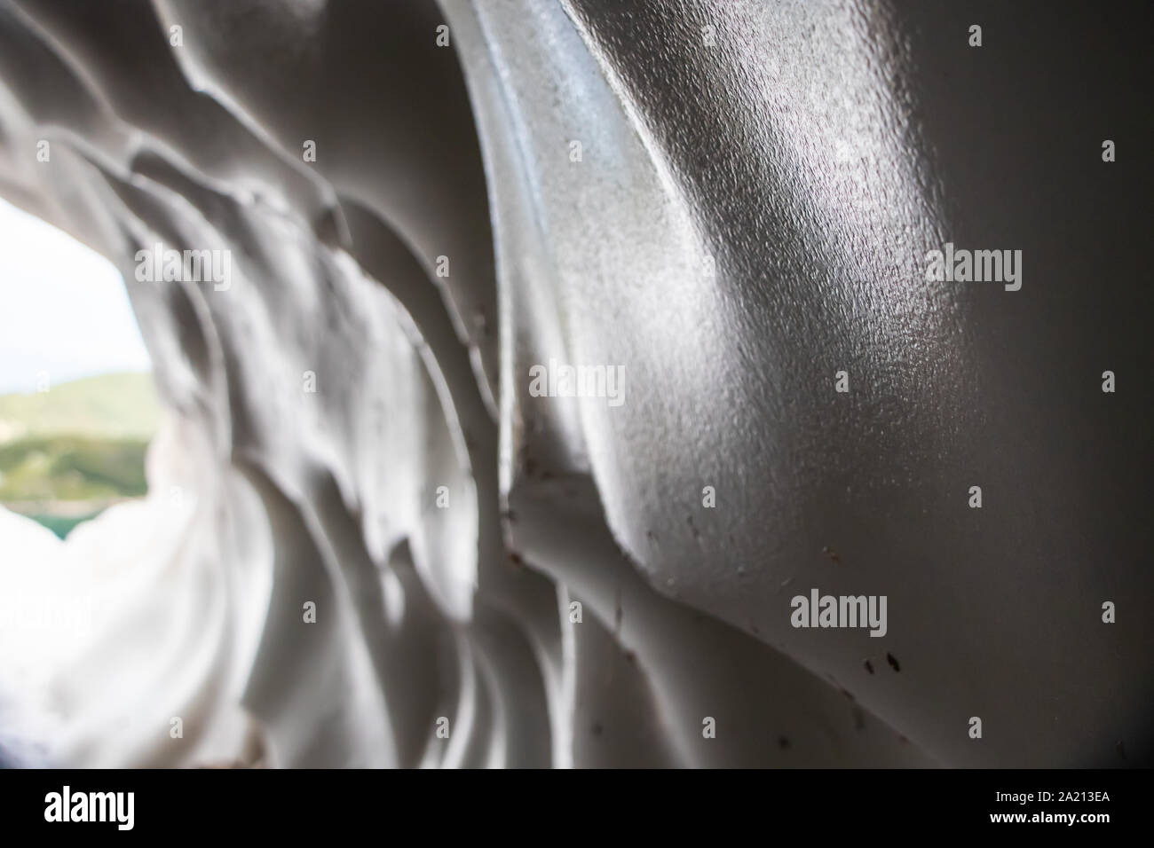 Ice cave in the mountain. Stock Photo