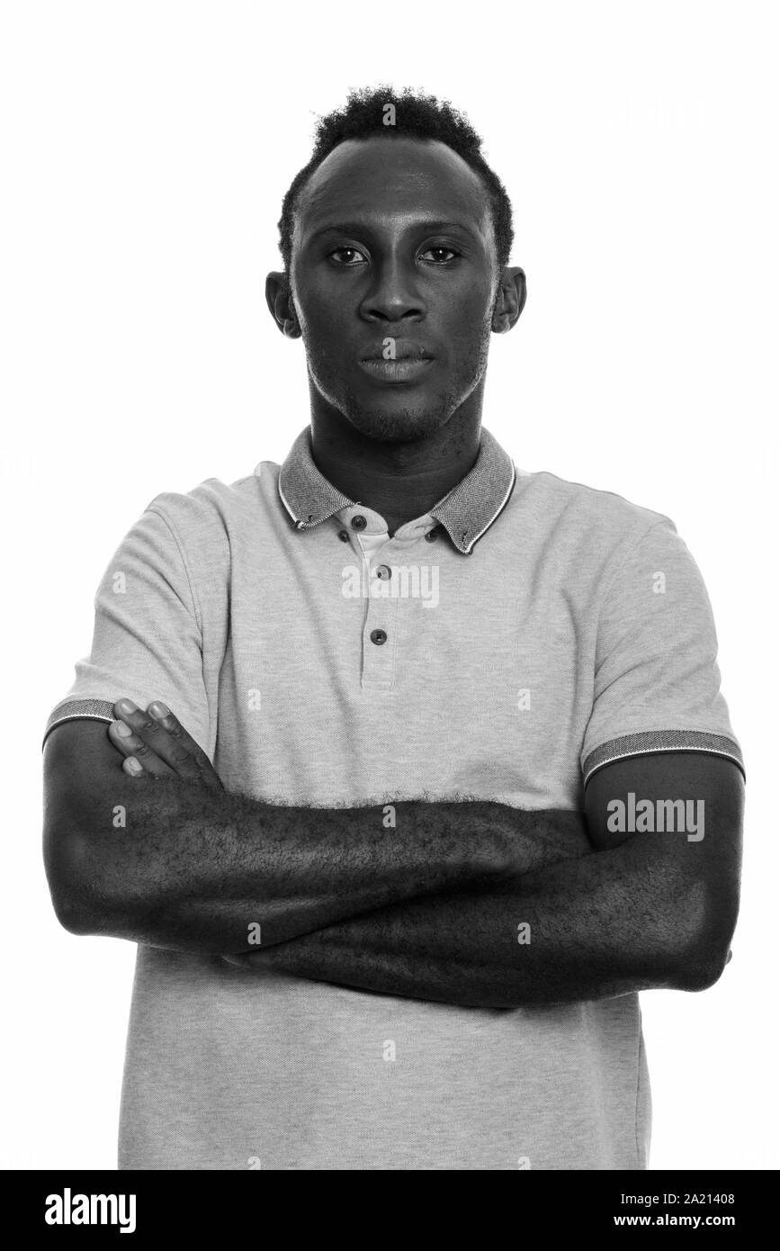 Young black African man with arms crossed Stock Photo - Alamy