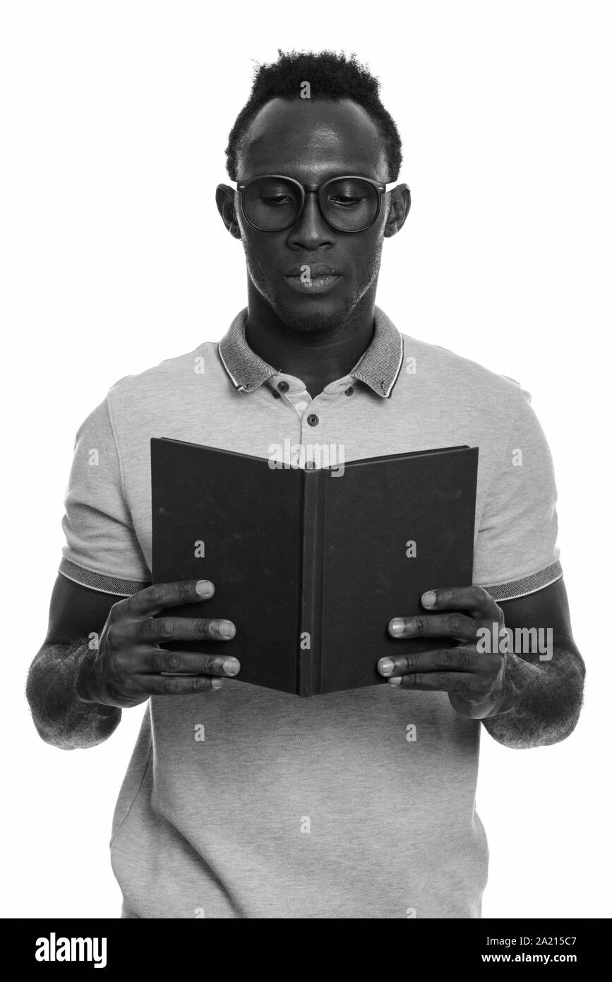 Studio shot of young African man in black and white Stock Photo - Alamy