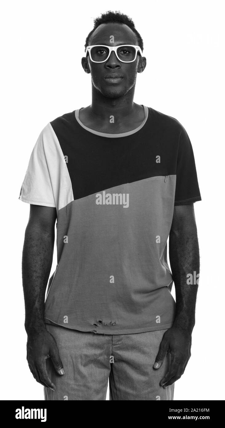 Studio shot of young African man in black and white Stock Photo - Alamy