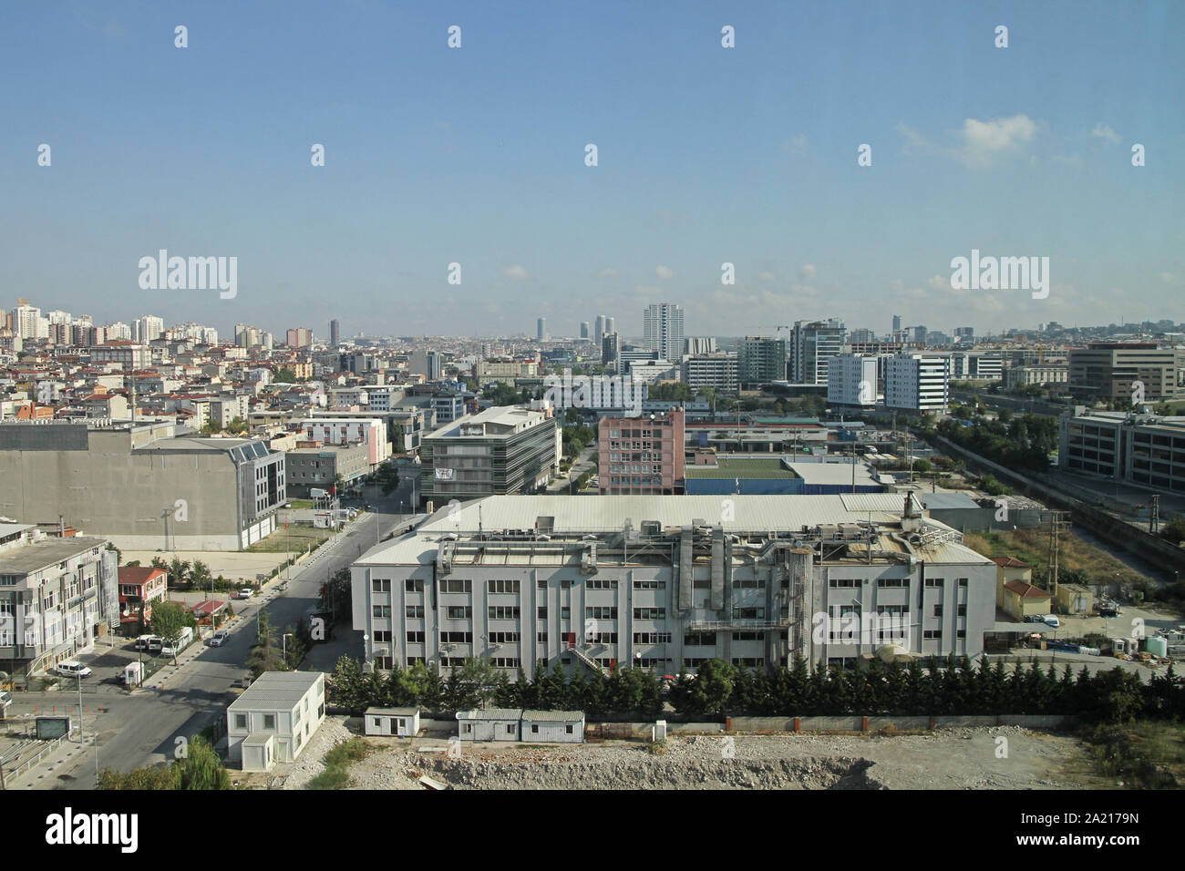 View of Istanbul Residential area with offices and apartment buildings against blue sky, Istanbul, Kucukcekmece District, the Republic of Turkey. Stock Photo