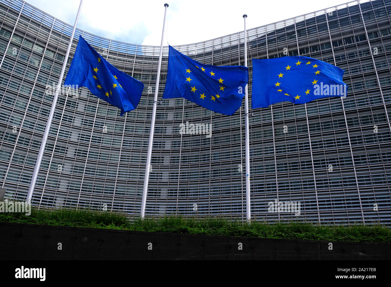 Brussels, Belgium. 30th Oct. 2019. The European Union flags fly at half-mast as a tribute to former French President Jacques Chirac in front of the European Commission building. Stock Photo