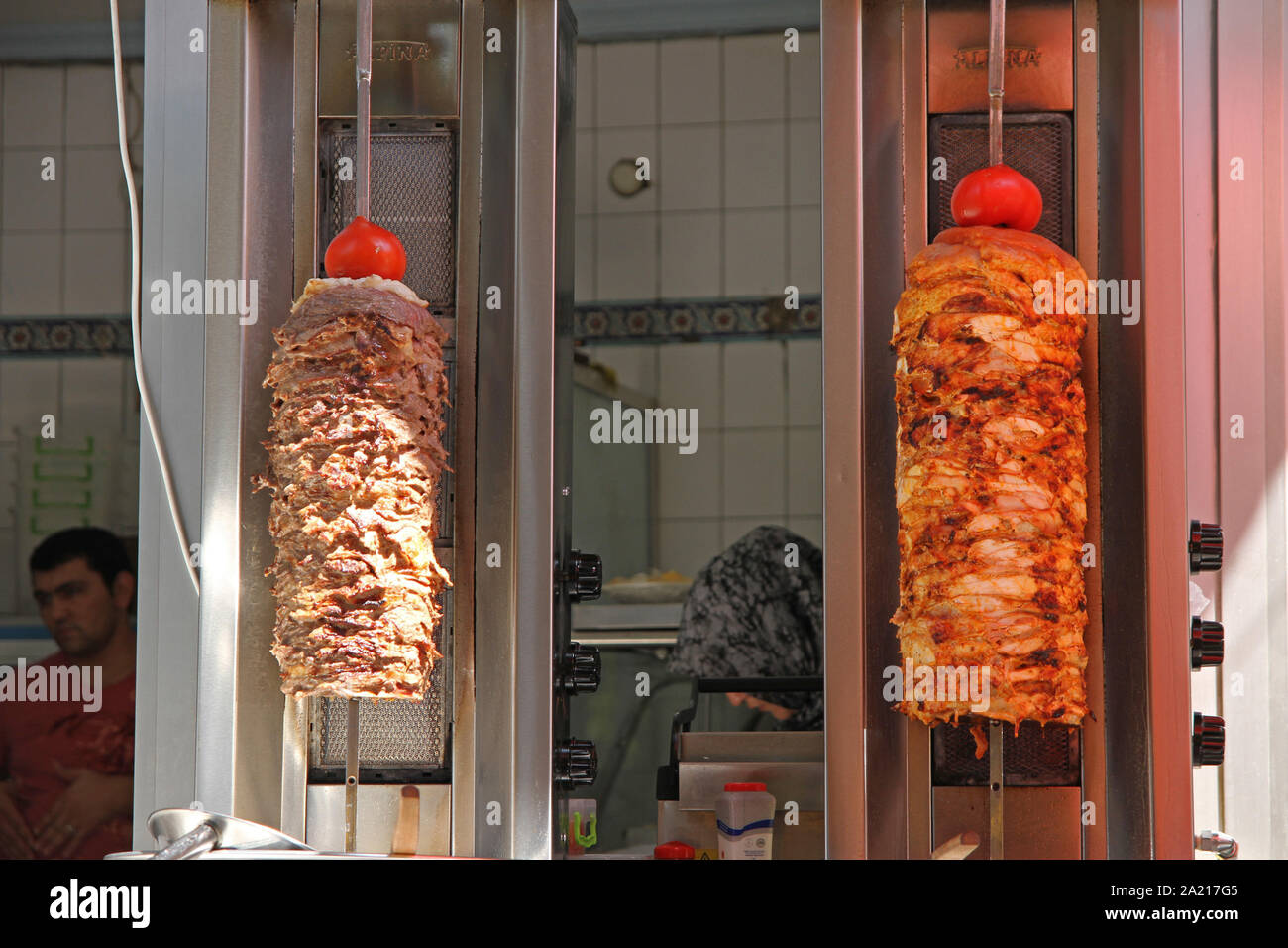 Two tradtional Turkish doner kebabs in front of shop, Istanbul, Turkey. Stock Photo