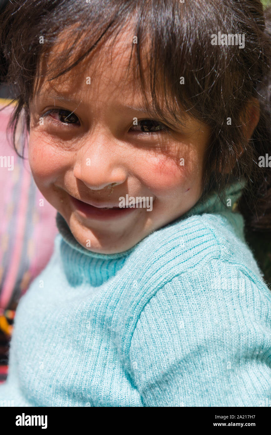 Young girl, aged 4 to 6 at a touristic event in the indigenous village of Puka Puka near Tarabuco, Quechuan people, Sucre, Bolivia, Latin America Stock Photo