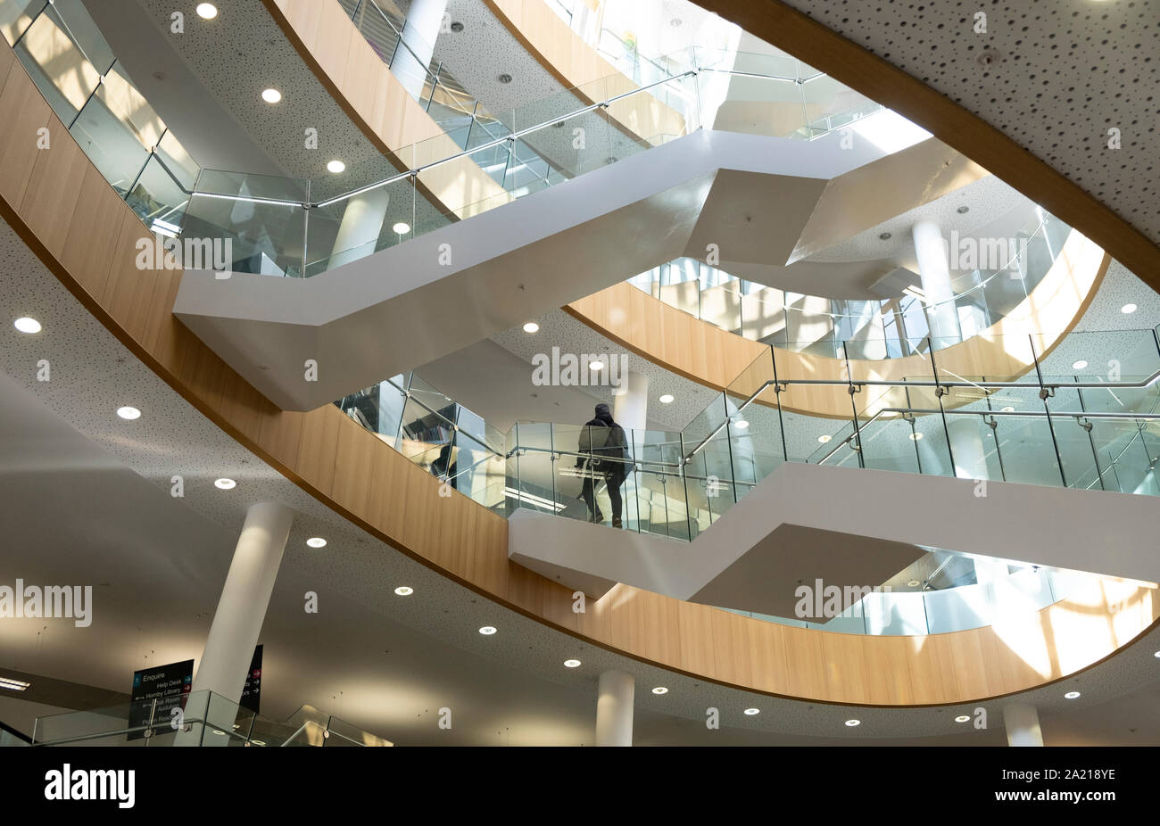 Liverpool Central Library, Liverpool, UK - overlapping staircases of glass and steel, stunning modern architecture behind a classical facade Stock Photo
