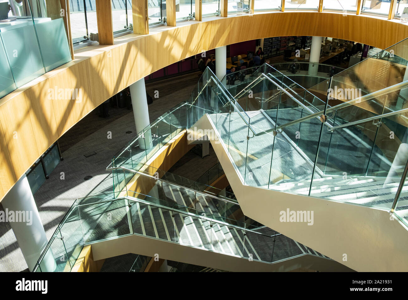 Liverpool Central Library, Liverpool, UK - overlapping staircases of glass and steel, stunning modern architecture behind a classical facade Stock Photo