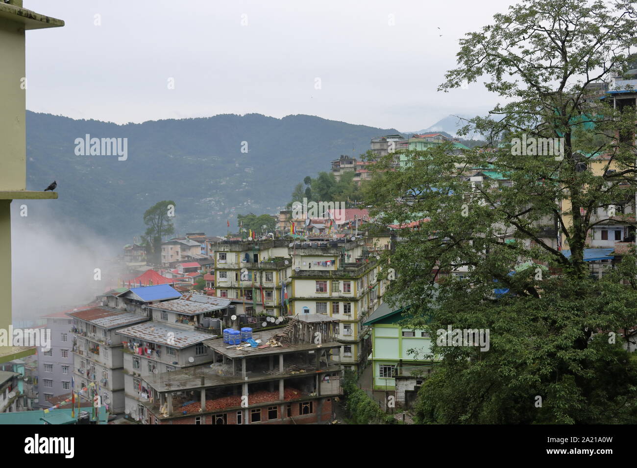 Morning Shot with clouds over the city at Gangtok, Sikkim, India Stock Photo