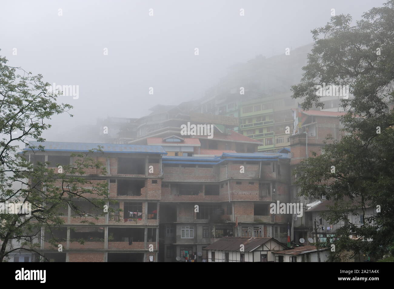 Morning Shot with clouds over the city at Gangtok, Sikkim, India Stock Photo