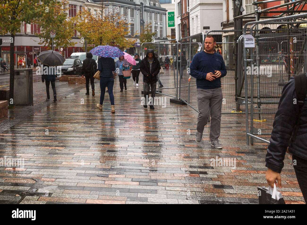 Cork, Ireland, 30th September 2019.   Yellow Weather Warning, Cork City. The status yellow weather warning for rain throughout the county didnt stop some shoppers from getting to the city today. The warning is in place till 4pm, this is ahead of Storm Lorenzo which may hit Thursday according to some forecasts.  Credit: Damian Coleman Stock Photo