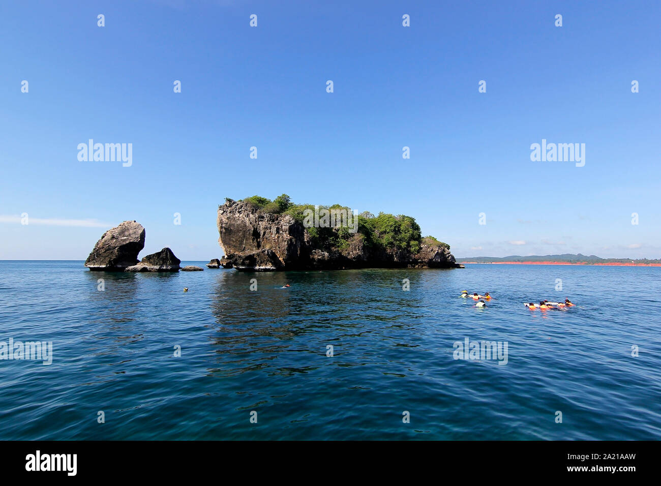 Snorkeler and tropical island hi-res stock photography and images - Alamy