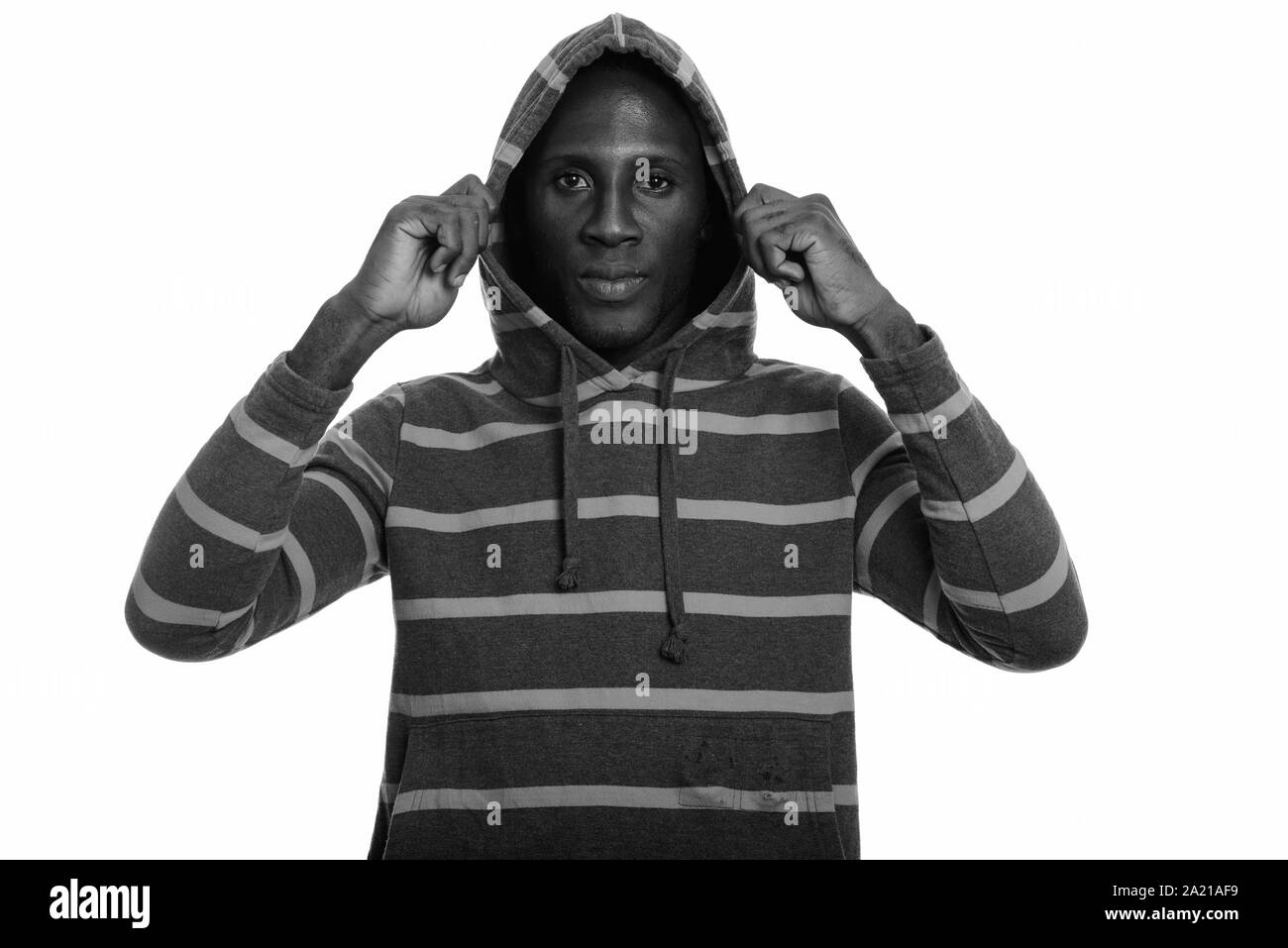 Young black African man holding and wearing hoodie Stock Photo
