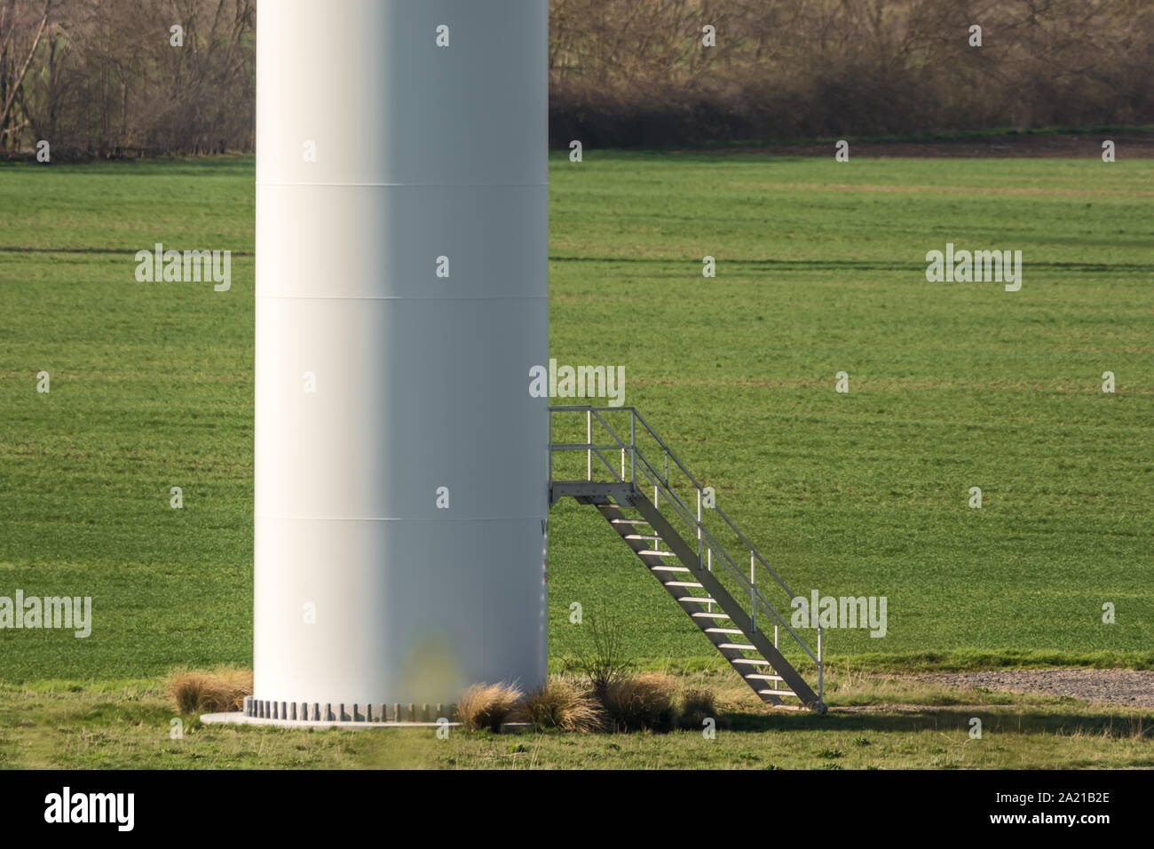 Entrance to a wind turbine with steel tube tower Stock Photo