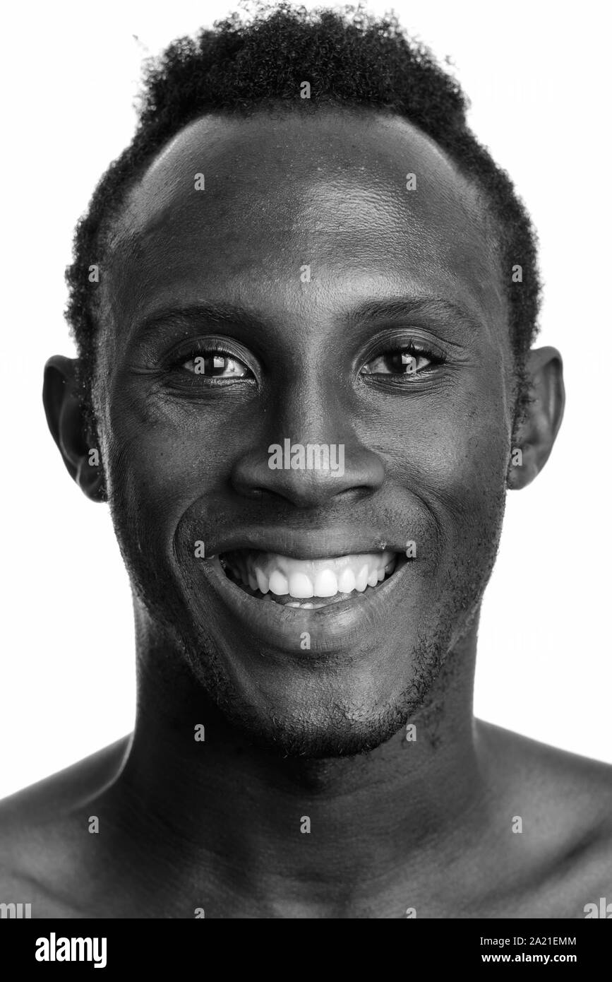 Face of young happy black African man smiling Stock Photo Alamy